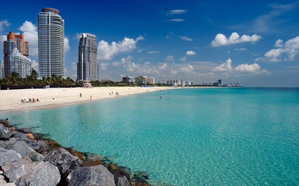 View of South Beach with its pristine white sand and towering high-rise buildings