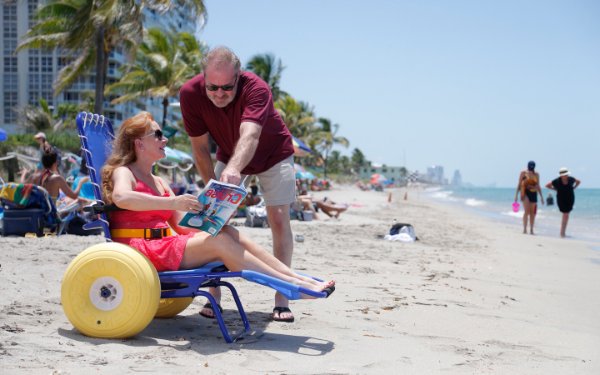 Lady on Joy on the Beach Wheelchair, by Special Needs Group® Special Needs at Sea®