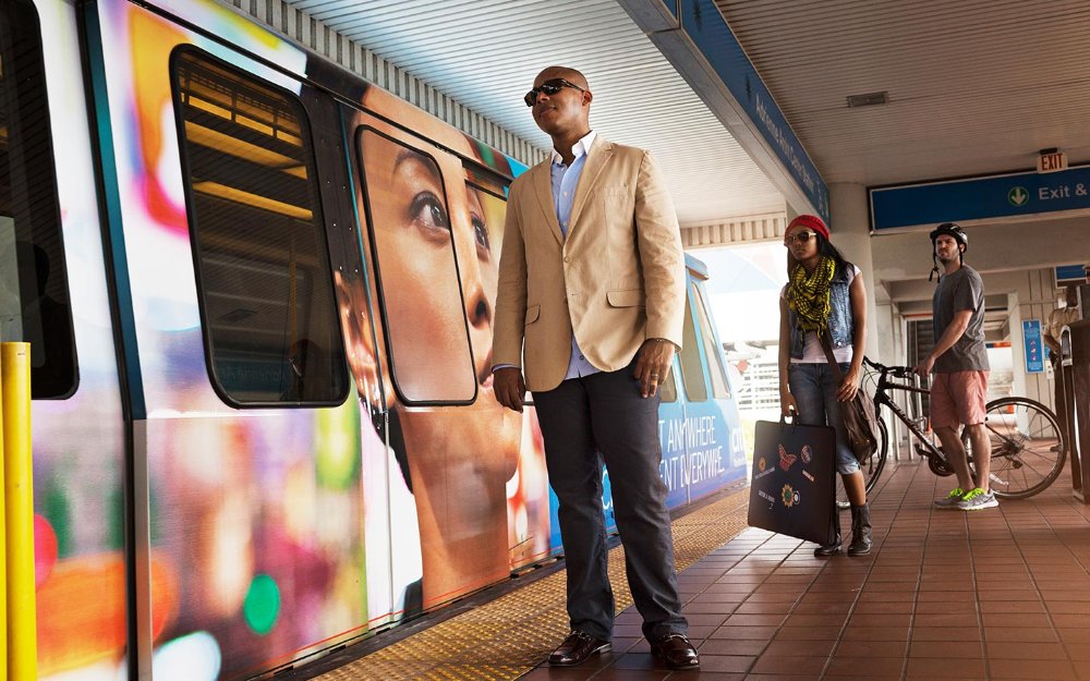 Visitor waits for Metromover at Adrienne Arsht Center station