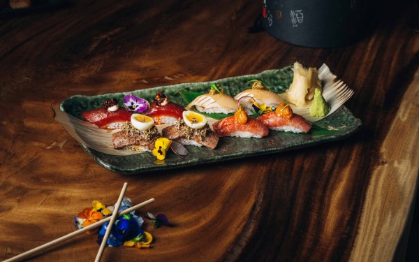 Komodo's nigiri special, decorated with colorful pansies