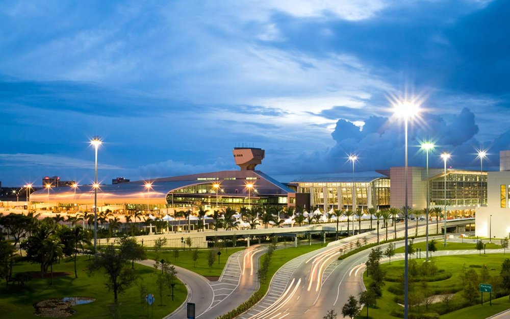 Miami International Airport tower terminal and entrance at night