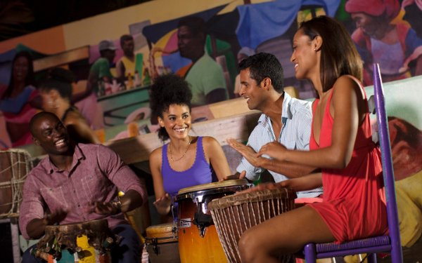 Friends playing conga drums in Little Haiti