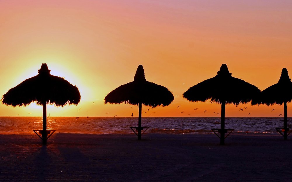 Historic Virginia Key Beach tiki huts at dawn