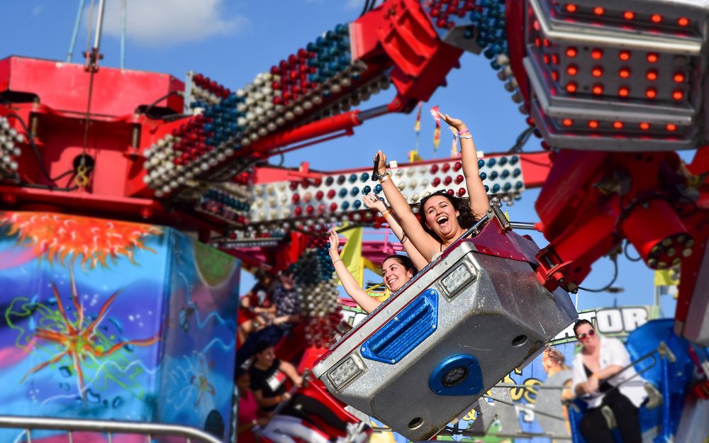 Hands up on a ride at The Youth Fair